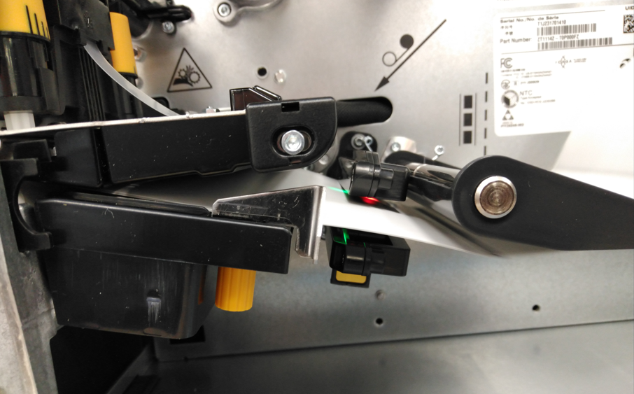 LED Turns Red on Media Sensors During Printing and Media Feeding